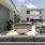 a building with a patio and tables