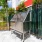 a metal grill on a patio
