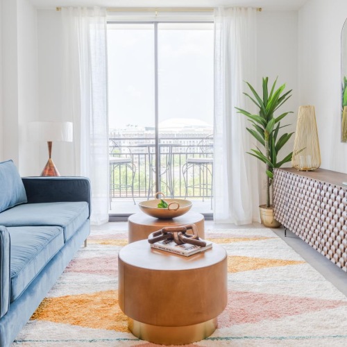 a living room with a couch and a table