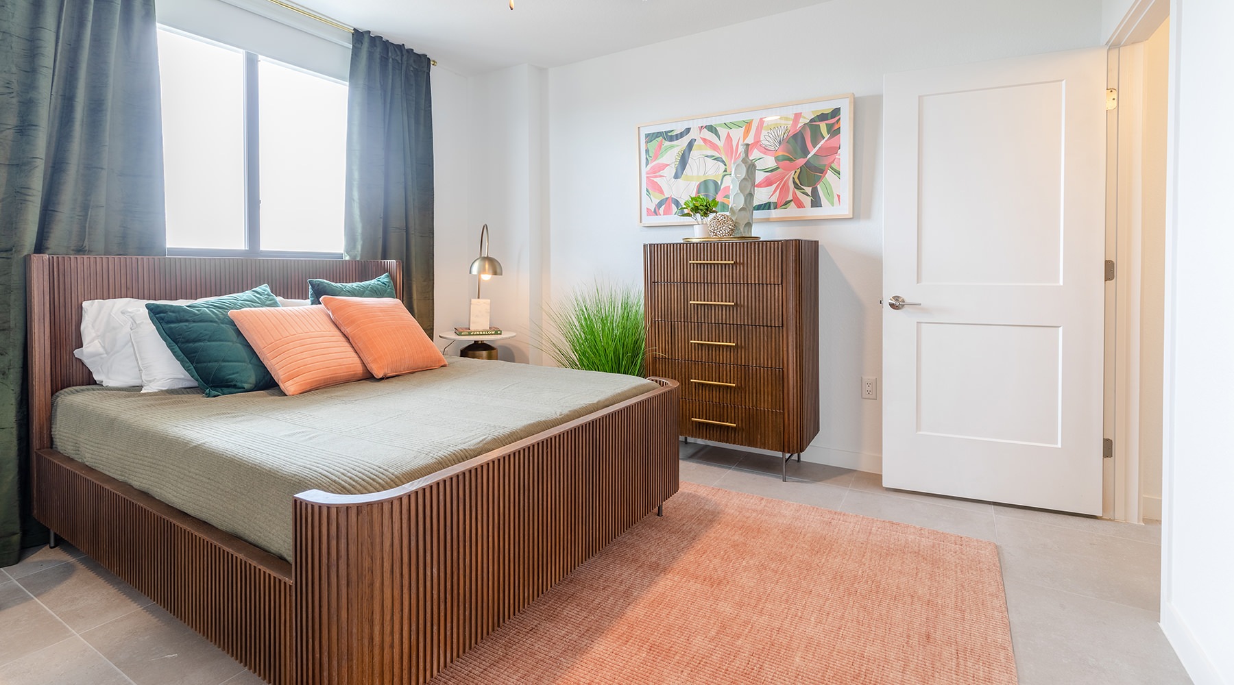 room with bed and dresser